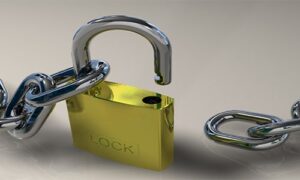 An unlocked lock with a chain