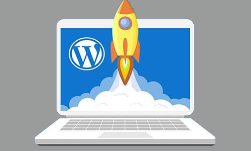 WordPress website speed with rocket on laptop computer